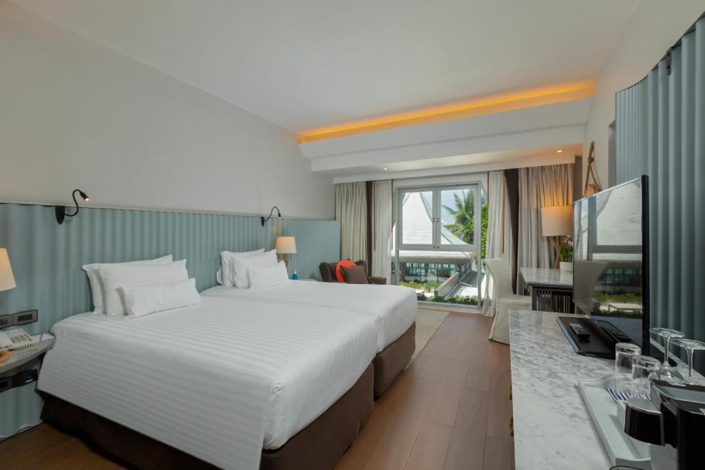 เดอะ โบทเฮ้าส์ ภูเก็ต  Hotel หาดกะตะ ภายนอก รูปภาพ